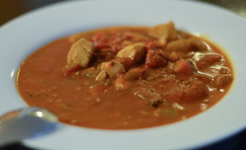 Cioppino served in white bowl