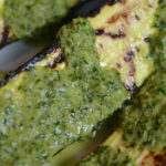 Chimichurri served over zucchini.
