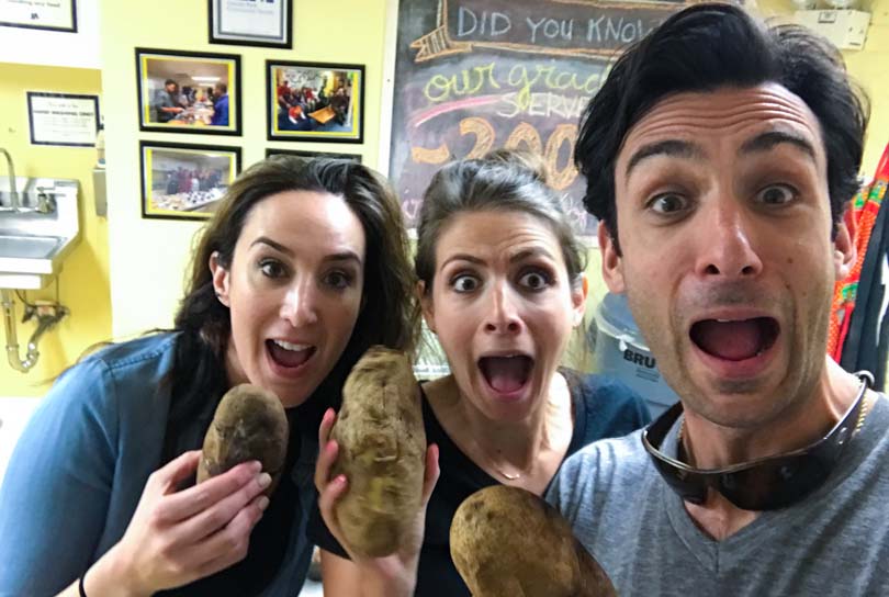 Girlfriend Val, Shalva, and Lenny serving loaded potatos at homeless shelter in Chicago.