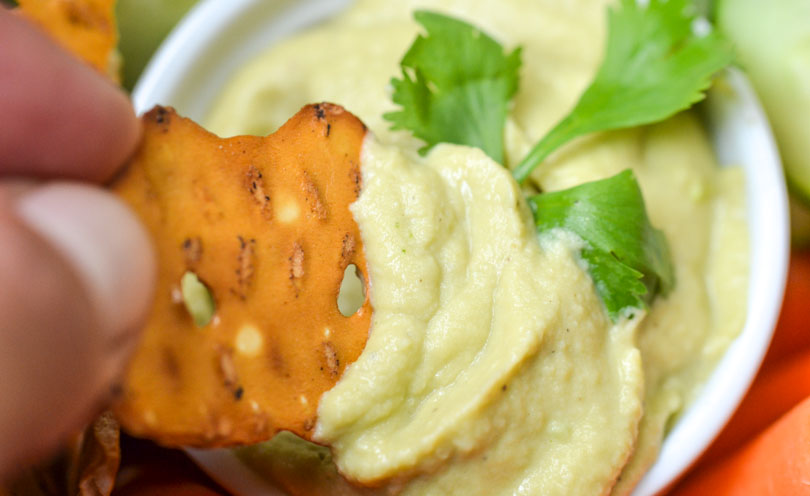 Jalapeño cilantro hummus with pretzel chip.