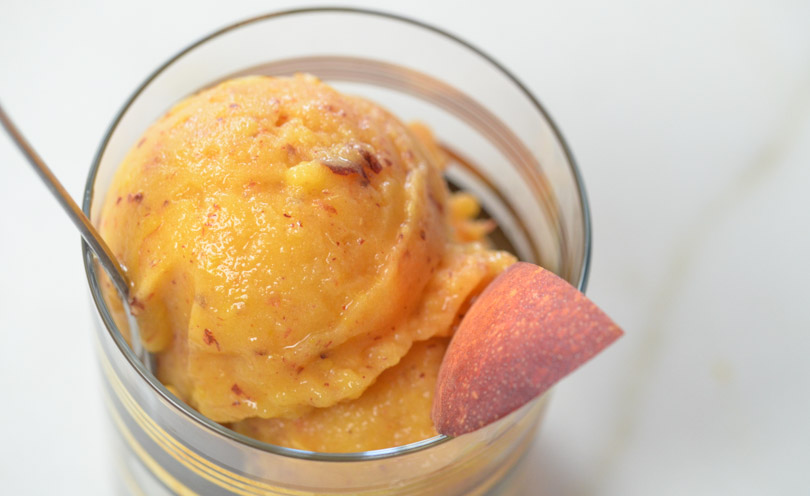 Peach buzz sorbet served.