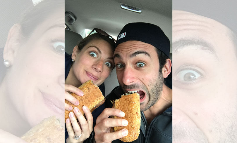 Shalva and Lenny eating sandwiches from Herbavorious butcher in 2017.