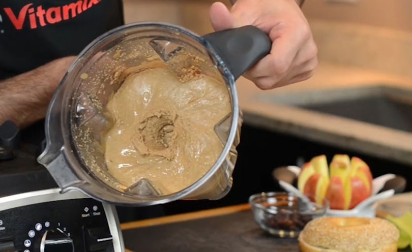 Nut butter in a Vitamix container.