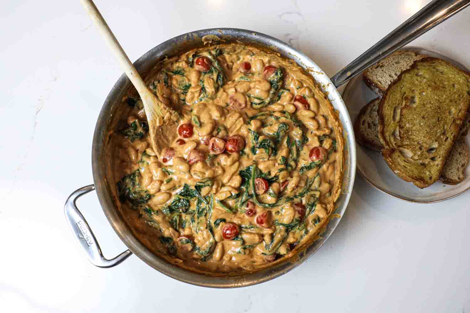 Cannellini Skillet in Cashew-Tomato Cream with Spinach and Basil